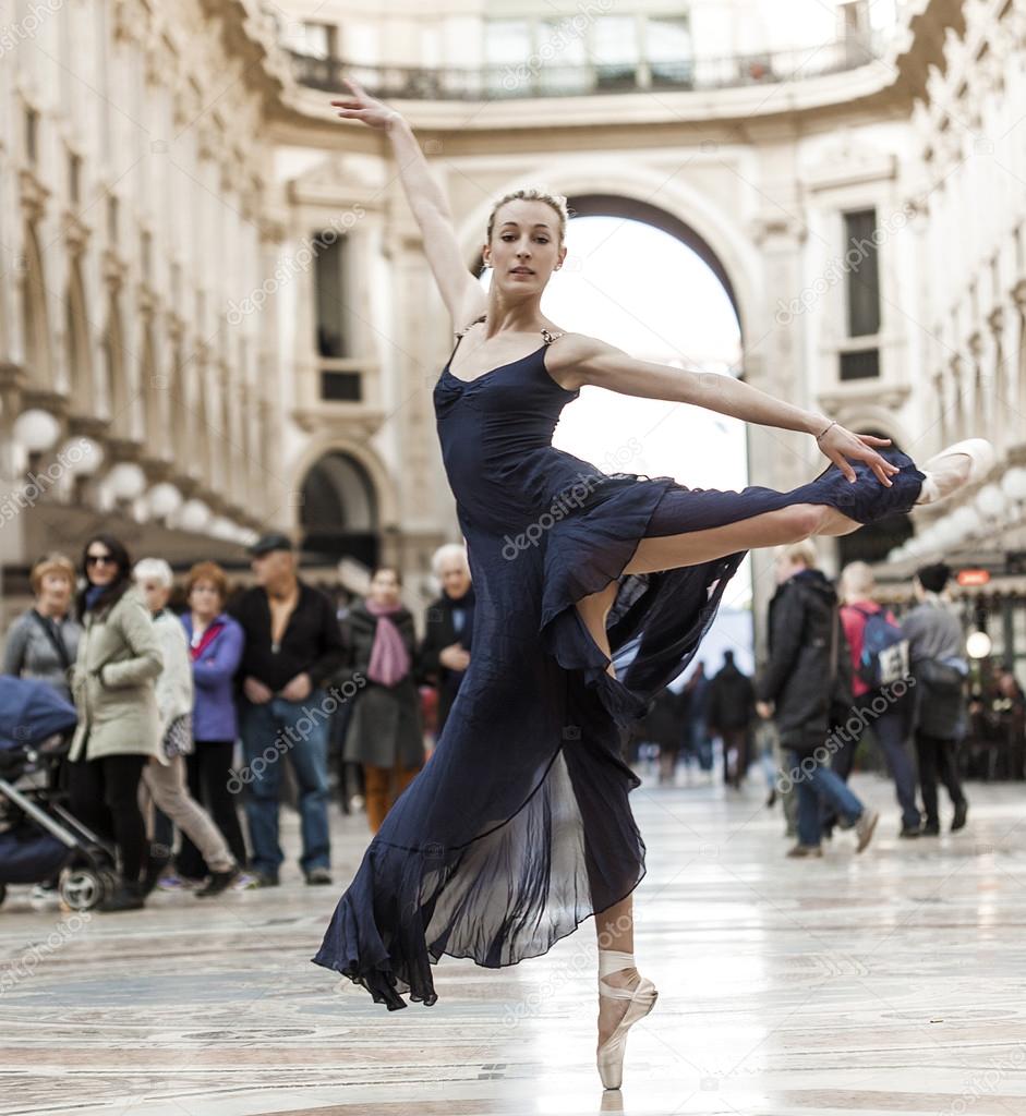 Elegant classical dancer performing in the city