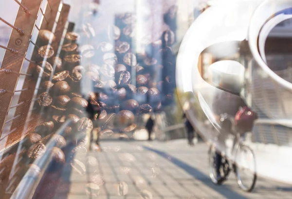 Double exposure of cup of coffee and blurred citylife — Stock Photo, Image