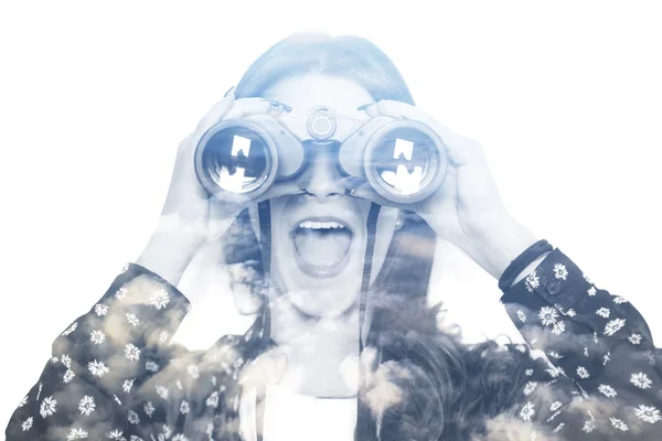 Double exposure of girl looking through binoculars and cloudscap — Stock Photo, Image