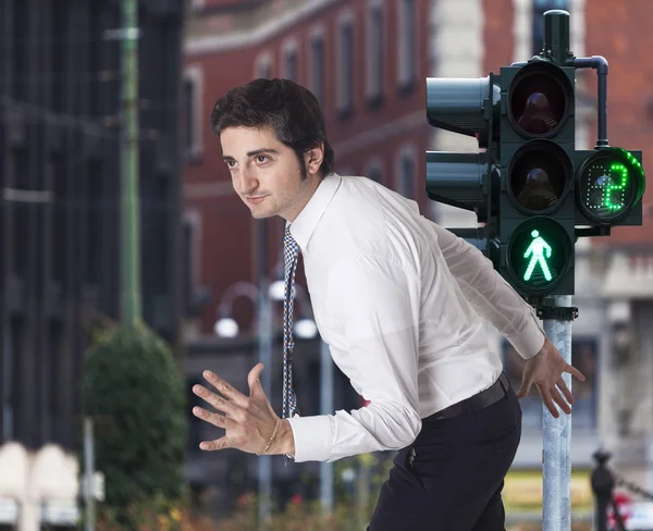 Businessman running in the city — Stock Photo, Image