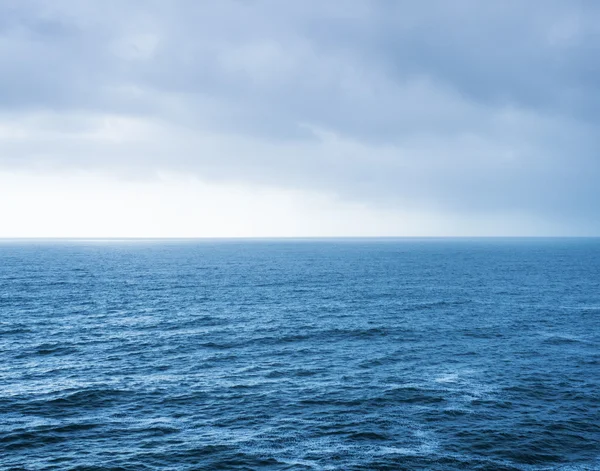 Blue sea landscape and overcast sky — Stock Photo, Image