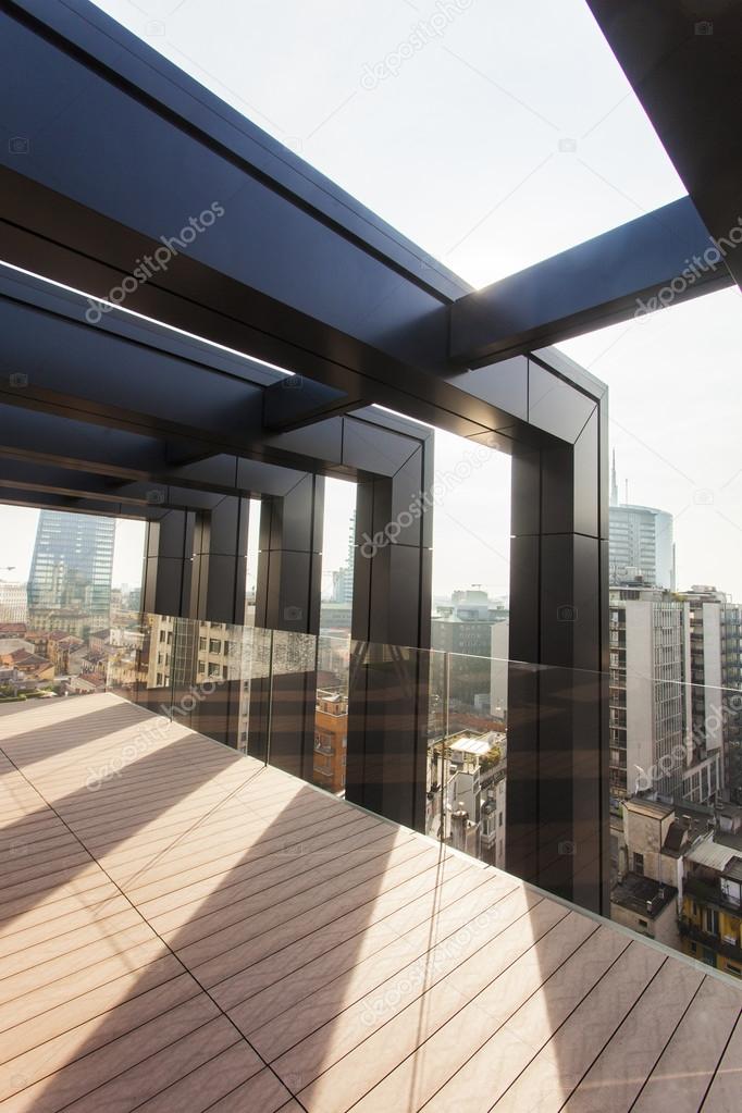 Milan cityscape seen from interior of modern building