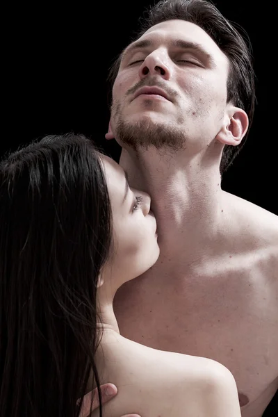 Woman portrait kissing his boyfriend neck — Stock Photo, Image