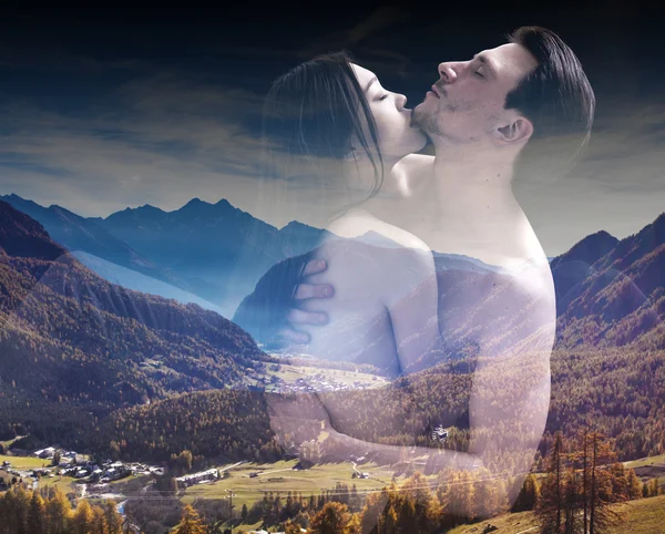 Double exposure of lovers cuddling and beautiful autumnal landsc — Stock Photo, Image