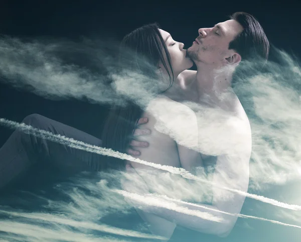 Double exposure of lovers cuddling and cloudscape — Stock Photo, Image