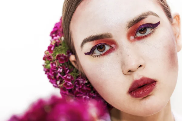 Gorgeous girl portrait wearing makeup and flowers — Stock Photo, Image