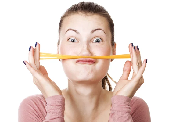 Beautiful and funny girl portrait with spaghetti mustache — Stock Photo, Image