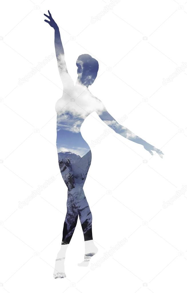 Double exposure of classical dancer and mountainscape
