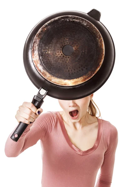 Disappointed girl portrait holding dirty frying pan — Stock Photo, Image