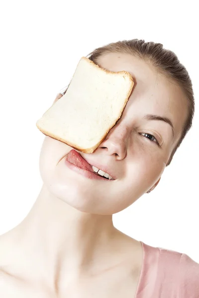 目の試飲でサンドイッチのパンのスライスと少女の肖像画 — ストック写真