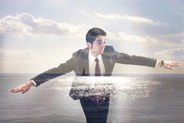 Double exposure of businessman flying and seascape — Stok fotoğraf