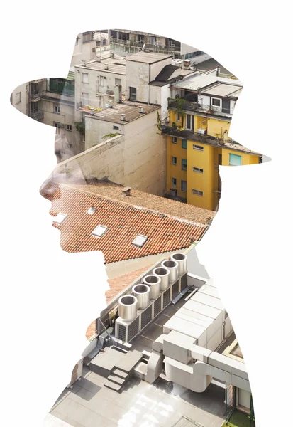 Double exposure of girl wearing hat and cityscape roofs — ストック写真