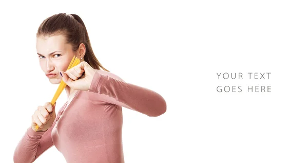 Beautiful fighter girl holding bunch of spaghetti card — Stock Photo, Image