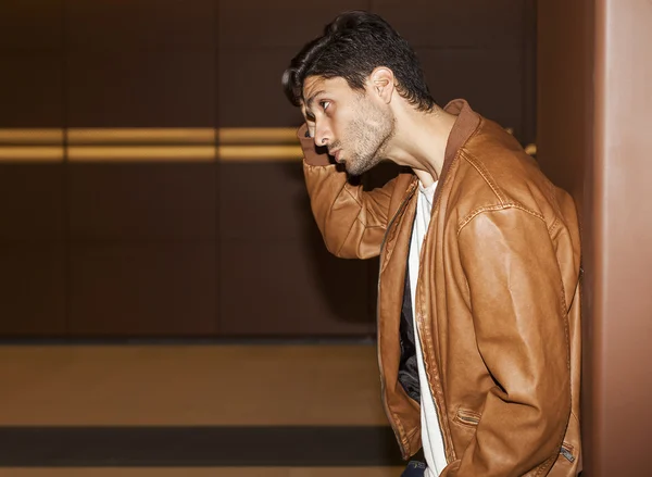 Handsome man profile portrait in the subway — Stock Photo, Image