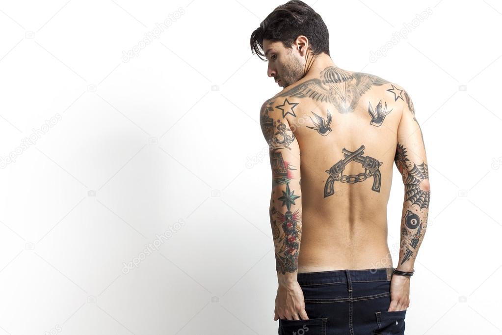 Sexy tattooed man back portrait
