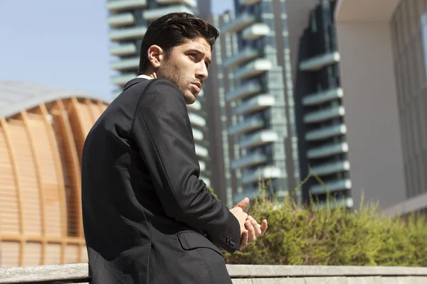 Handsome businessman portrait and city background — Stock Photo, Image