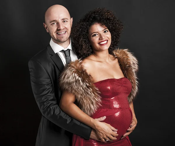 Happy and elegant couple portrait expecting baby — Stock Photo, Image