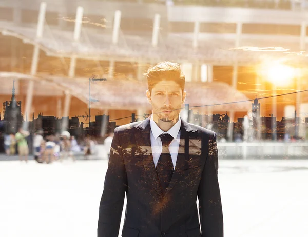 Double exposure of businessman and city sunset — Stock Photo, Image