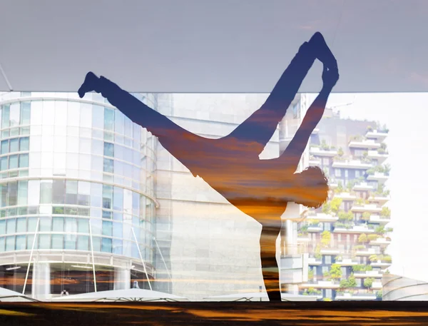 Double exposure of dancer silhouette and sunset cloudscape — Stock Photo, Image