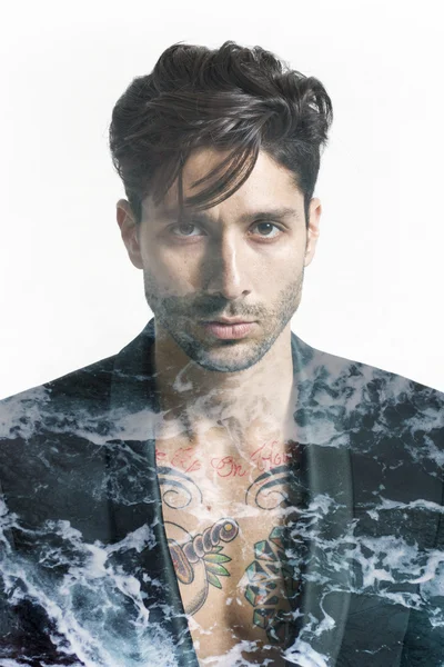 Double exposure of handsome man and sea foam — Stock Photo, Image