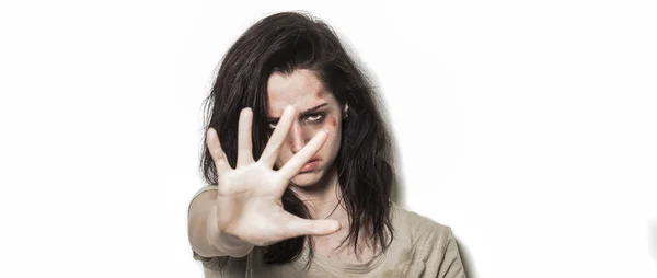 Beaten up girl asking to stop with strong look letterbox — Stock Photo, Image