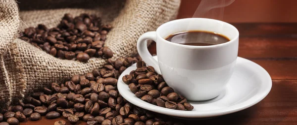 Coffee cup and jute sack full of coffee beans letterbox — Stock Photo, Image