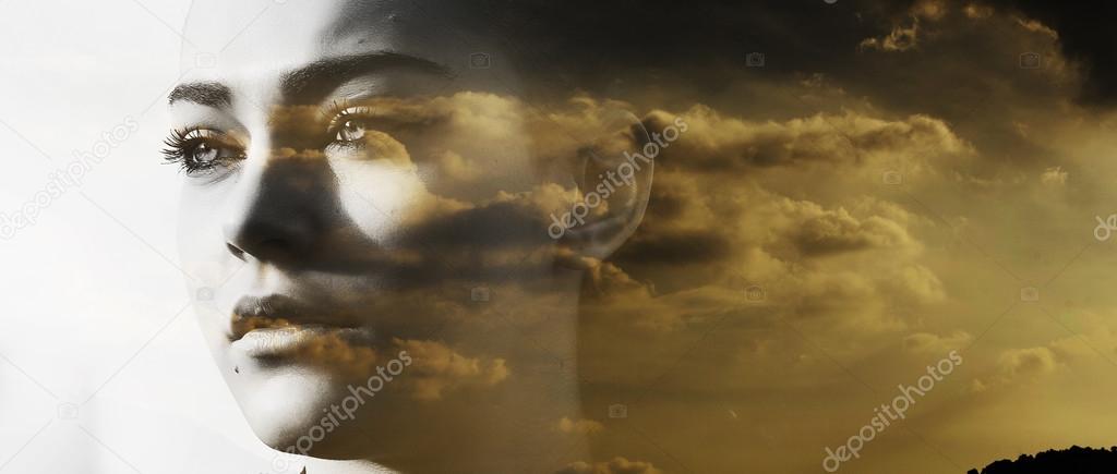 Double exposure of beautiful girl and orange cloudscape letterbo