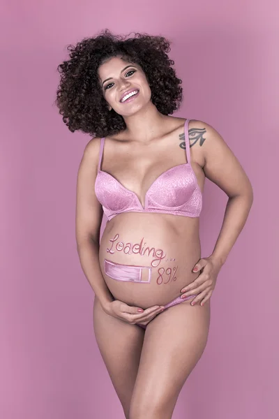 Beautiful pregnant woman with painted belly — Stock Photo, Image