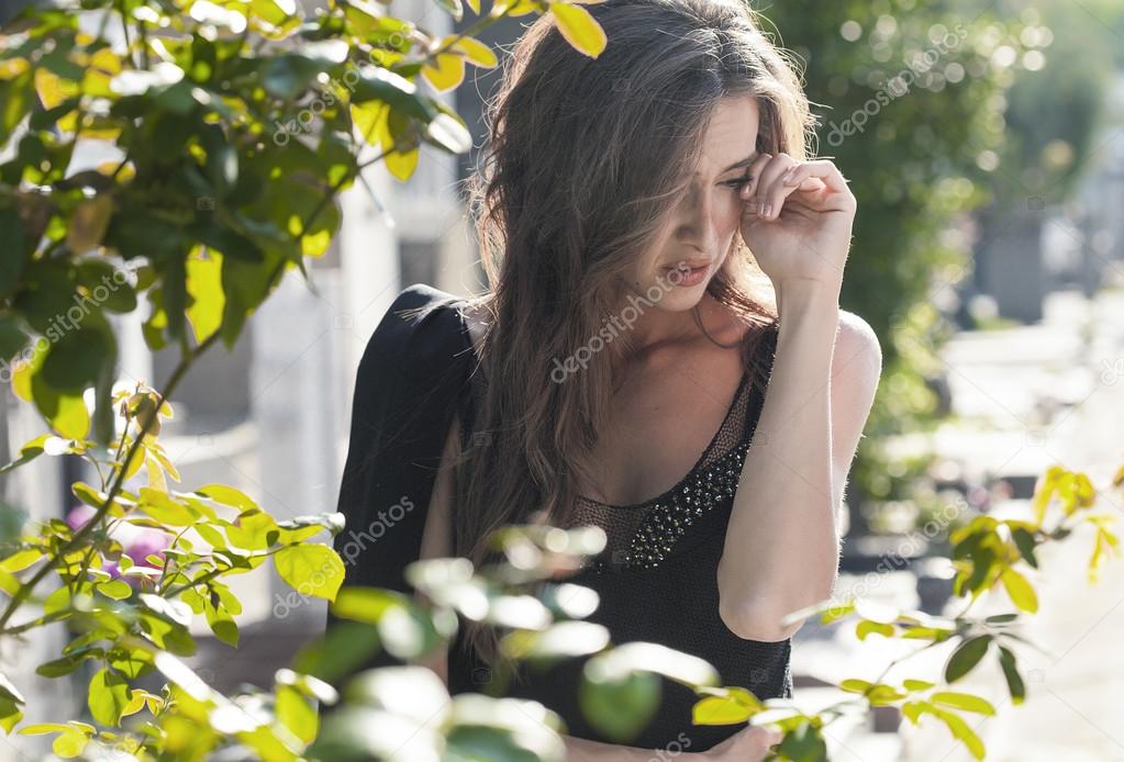 Sad woman portrait in grief