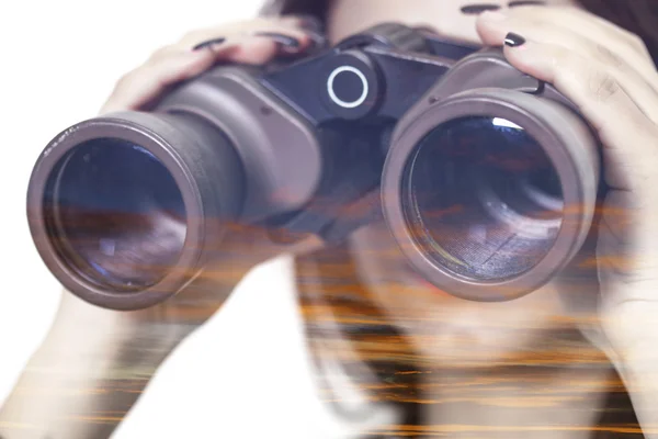 Double exposure of binoculars and colorful sunset — Stock Photo, Image