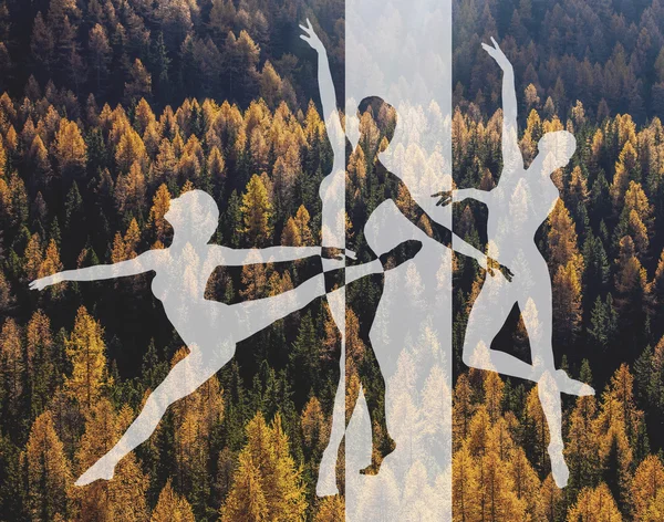 Double exposure of dancer silhouettes and autumn wood — Stock Photo, Image