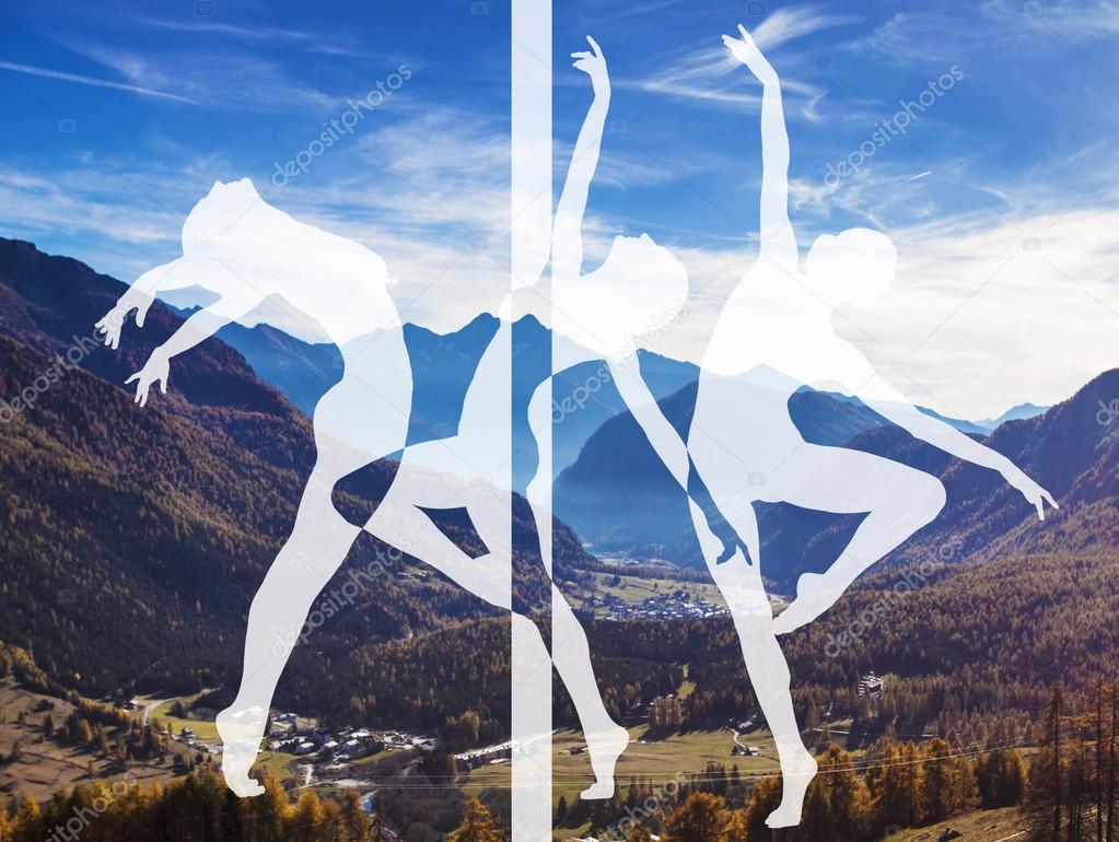 Double exposure of dancer silhouettes and autumn mountainscape