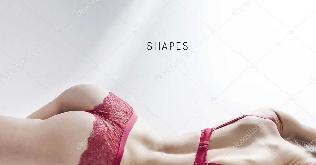 Sensual woman shapes wearing red lingerie