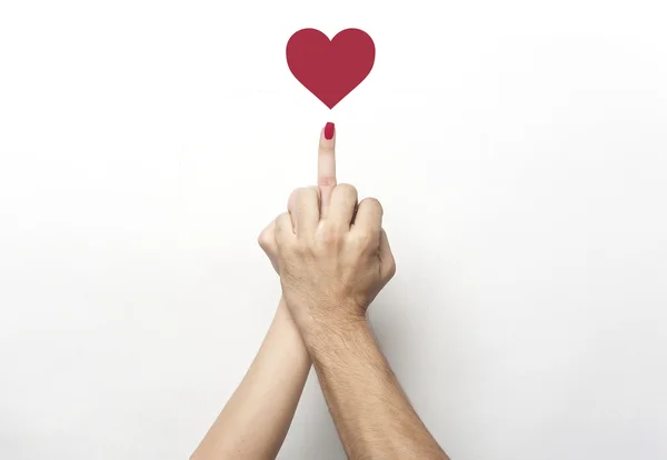Middle finger gesture with red heart — Stock Photo, Image