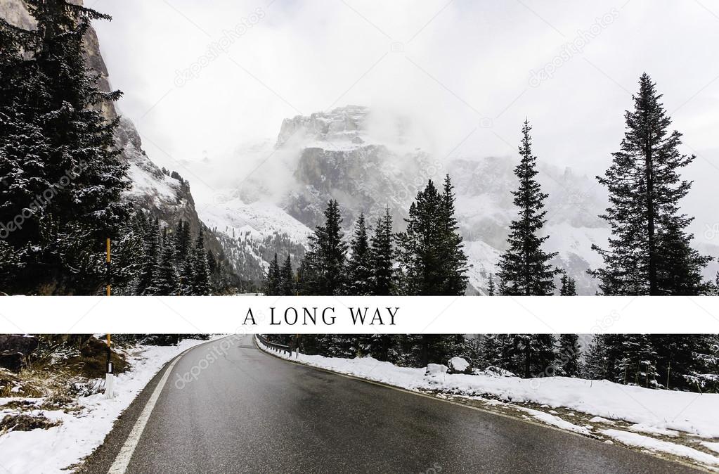 A long way - driving in rainy winter landscape