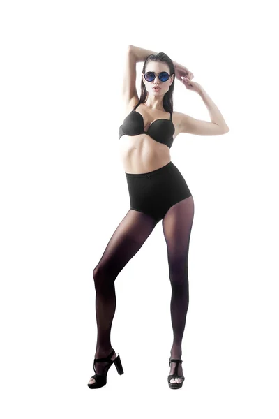 Sexy girl wearing lingerie, stockings and sunglasses — Stock Photo, Image