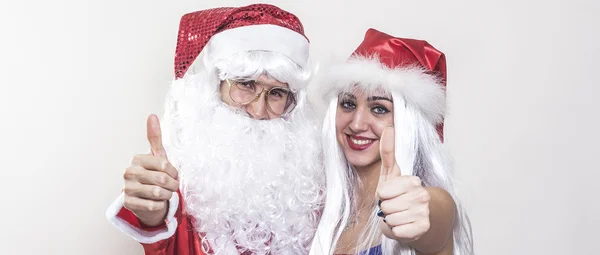 Female and male Santa Claus thumbs up letterbox — Stock Photo, Image