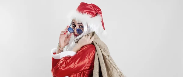 Female Santa Claus delivering gifts letterbox — Stock Photo, Image