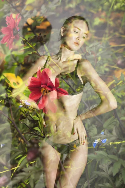 Double exposure of beautiful model posing and red flowers — Stock Photo, Image