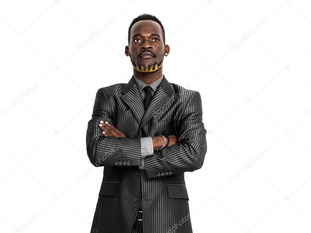 Handsome african businessman portrait wearing suit with crossed 