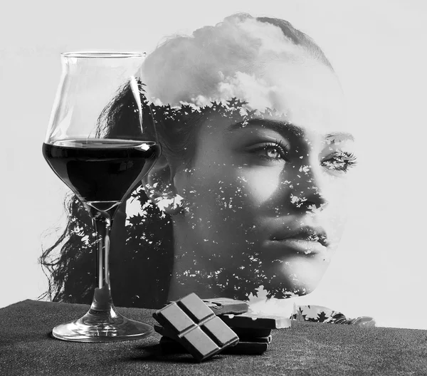 Wine glass with chocolate and double exposed girl with tree — Stock Photo, Image