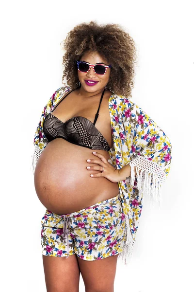 Cool pregnant woman wearing bra, shorts and sunglasses — Stock Photo, Image