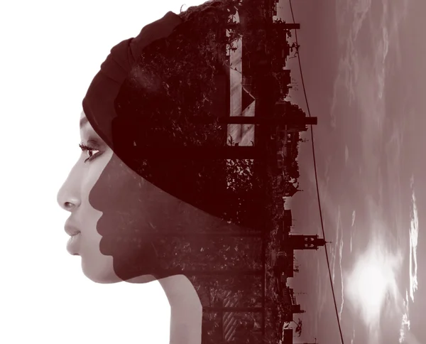 Double exposure of girl profile portrait and cityscape — Stock Photo, Image