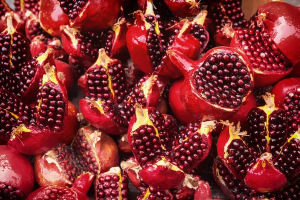 Red pomegranates background — Stock Photo, Image