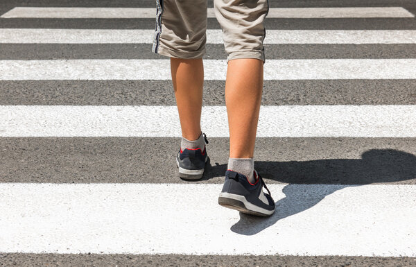 Crosswalk. Pedestrian on road