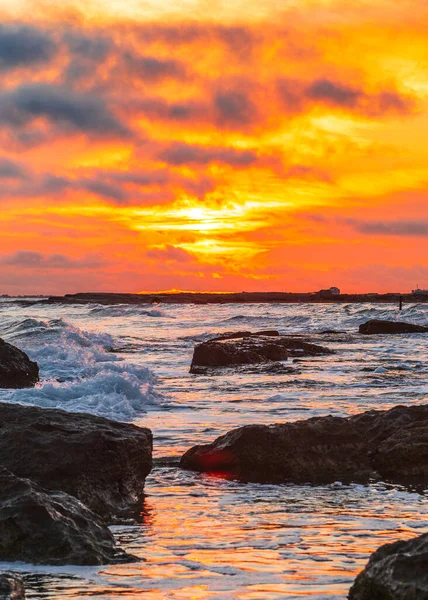 stock image Colorful sunrise on the rocky coast