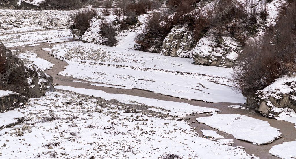 Mountain river bed in winter