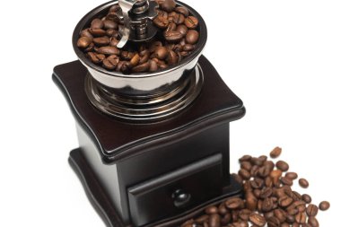 Retro manual coffee grinder on white background