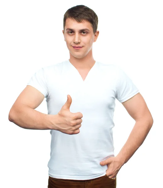 Young man shows thumb up gestur — Stock Photo, Image