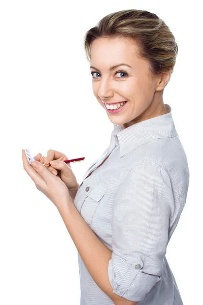 Retrato de mulher de negócios com um bloco de notas — Fotografia de Stock